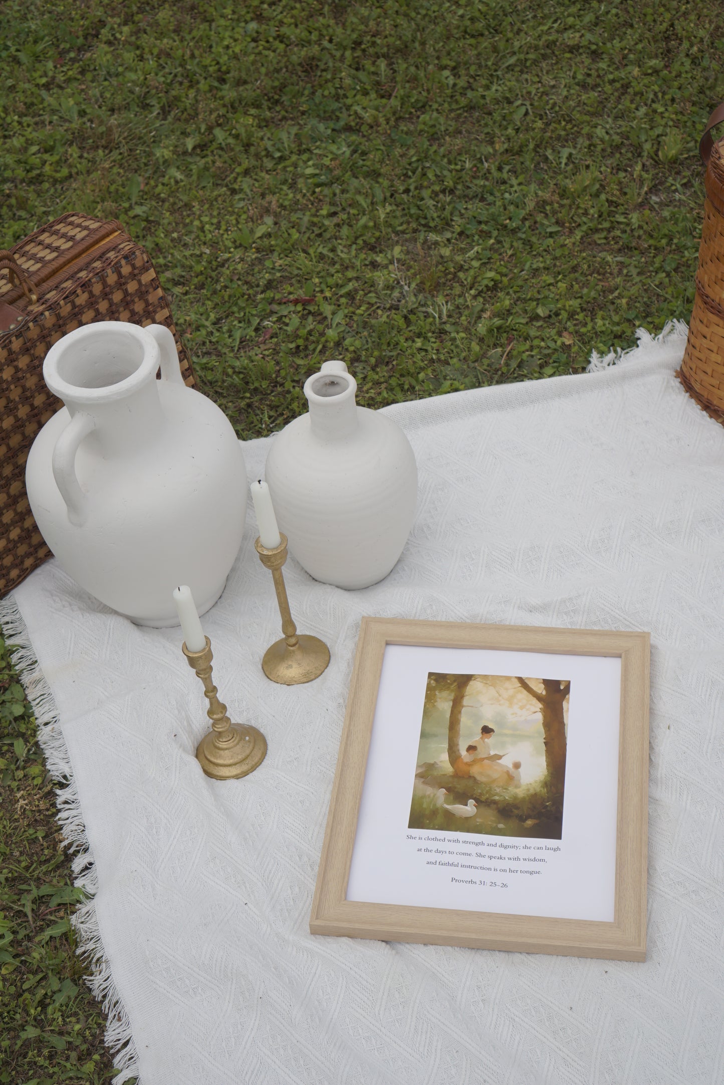 Decorative scene with a framed picture, white vase, and gold candlestick on a textured surface. By the Pond Christian wall art modern by Christian artist capturing peace in God’s presence.
