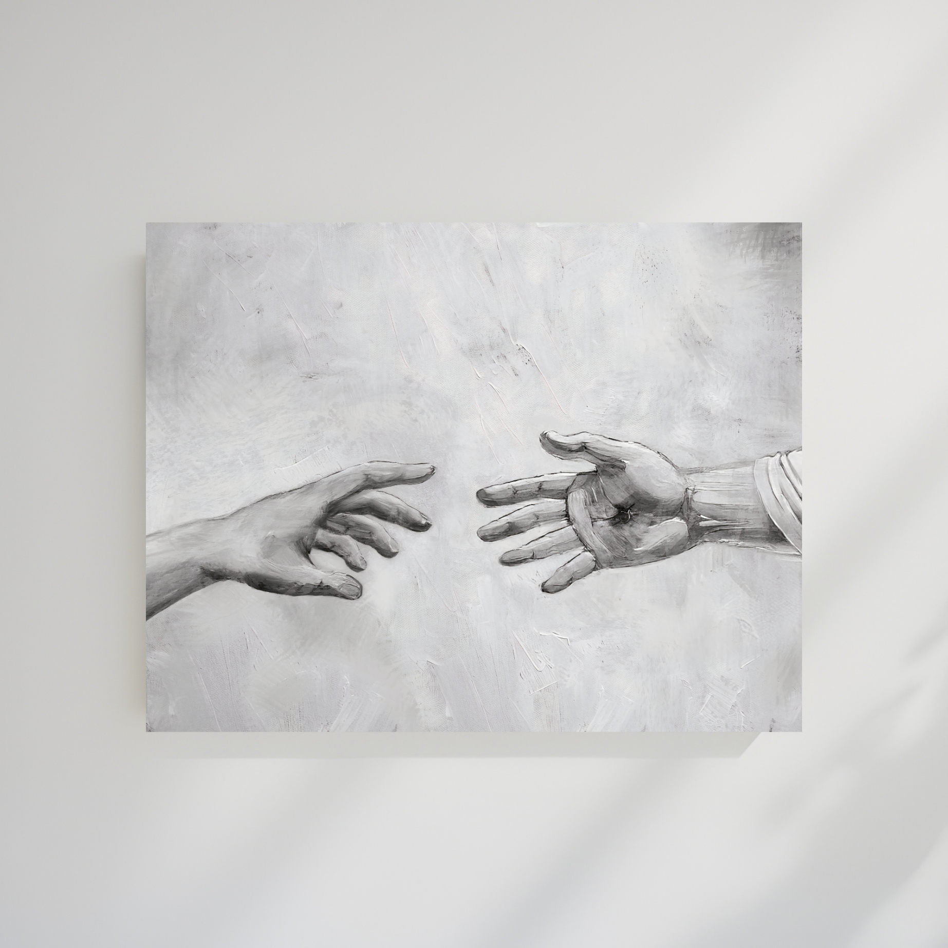 Artistic depiction of two hands reaching towards each other on a textured gray background. Reaching Out B&W Christian wall art modern of Jesus’ hand, black and white faith artwork.