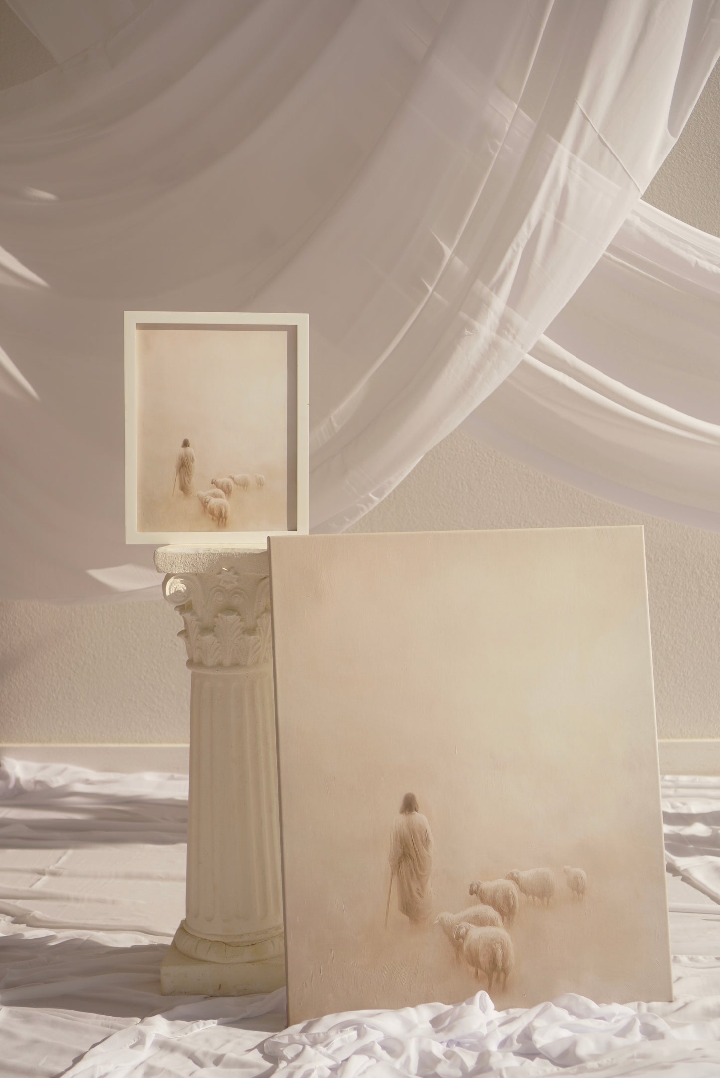 Statues and columns in a misty, ethereal setting with draped fabric. Gentle Shepherd Christian wall art by Christian artist showing Jesus as the caring Shepherd.