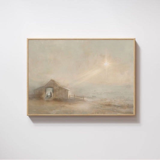 Framed artwork of a misty landscape with a building on a white wall. Canvas print of a historical scene in front of a decorated Christmas tree. Christian Christmas artwork made by a christian artist. Nativity scene artwork.